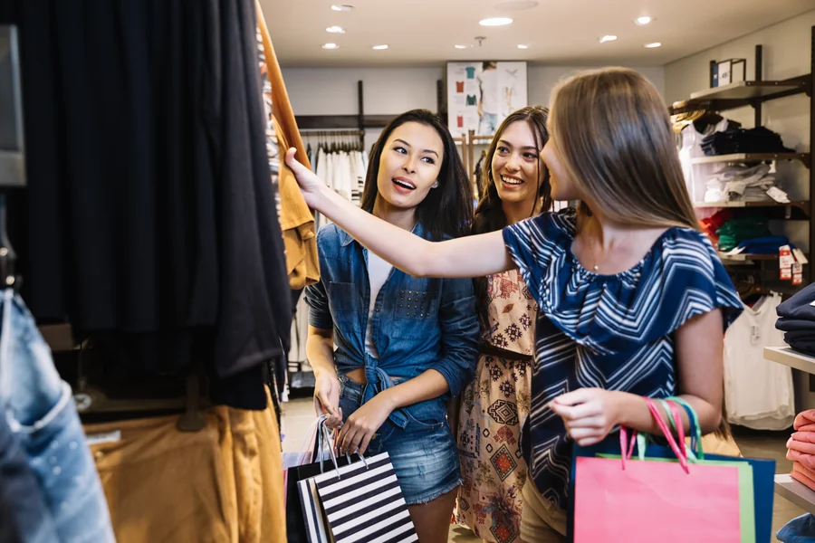 Young female customers in the retail shop